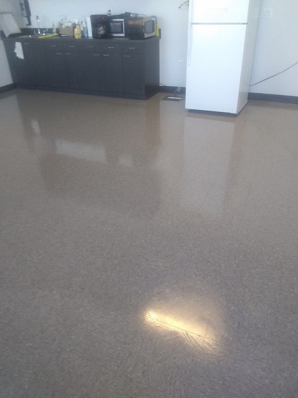 A shiny clean floor in a kitchen